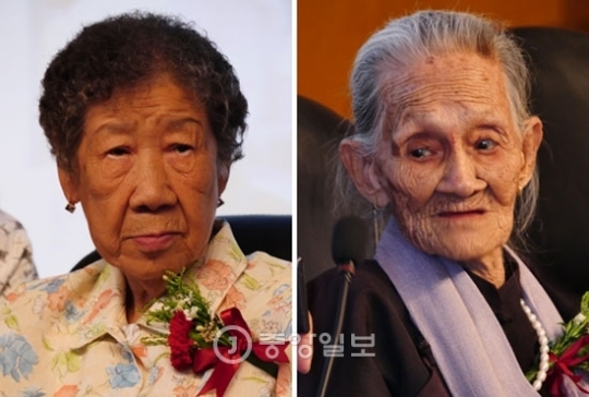 中国人慰安婦被害者の卓天妹さん（右）と韓国人被害者の姜日出（カン・イルチュル）さんが１７日夜、上海で会った。２人は辛かった過去について話し出そうとしなかった。お互い健康を尋ねて心配し、「日本の謝罪を受けるまで長く生きよう」と話した。