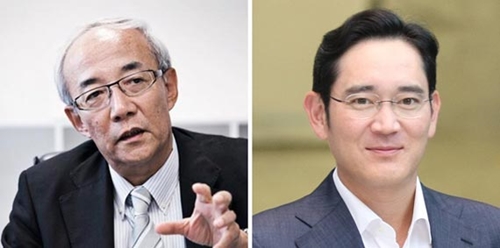 福田民郎氏（左）、李在鎔（イ・ジェヨン）サムスン副会長（右）