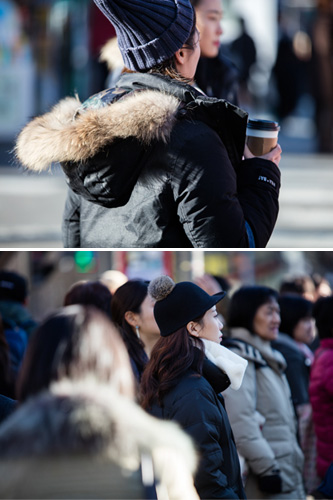 頭をすっぽりと覆うタイプのニット帽や、ちょこんと可愛らしい飾りがついたフェルトキャップなど冬物帽子をかぶる人も。