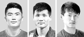 北朝鮮サッカー選手の韓光成（ハン・グァンソン）、朴光龍（パク・グァンリョン）、崔宋赫（チェ・ソンヒョク、左から）。