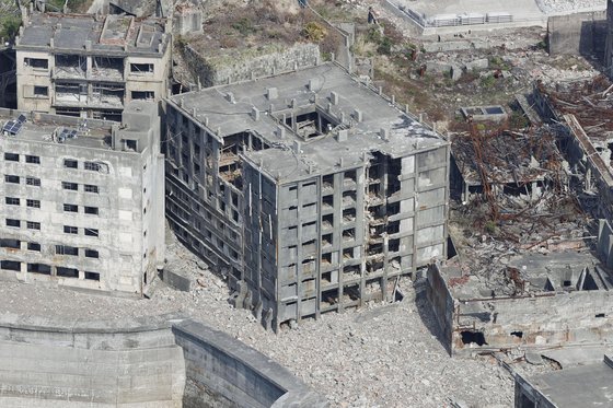 部分崩壊された「軍艦島」（写真　連合ニュース）