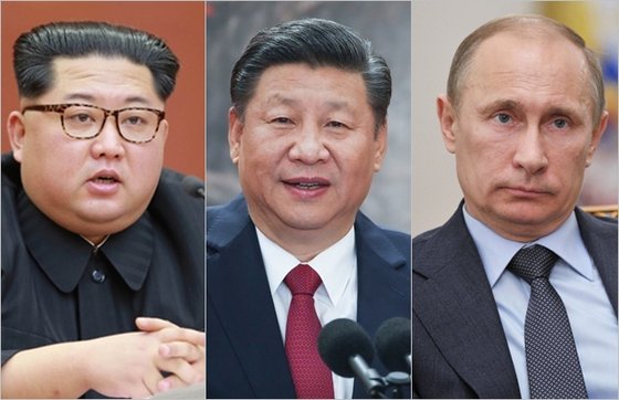 左側から北朝鮮の金正恩国務委員長、中国の習近平国家主席、ロシアのプーチン大統領。［中央フォト］