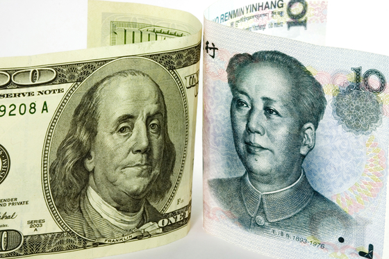 米ドルと中国元［中央フォト］