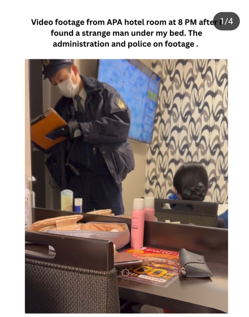 ホテルのベッドの下から見知らぬ男性が見つかった後、日本の警察が取り調べを行う様子。［写真　ナタリー・コメンコさんのＳＮＳ］