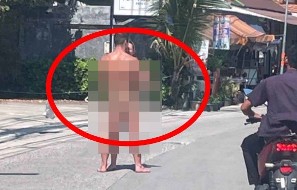 タイ・パンガン島のビーチで裸で抱き合っているポーランド人男女。［写真　パンガン島警察署］