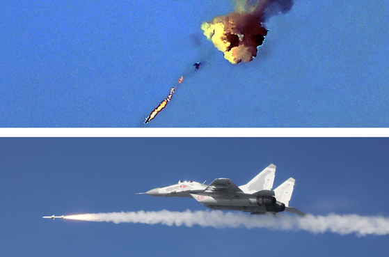 北朝鮮のミグ２９戦闘機が１５日、中距離空対空ミサイルを発射している。空対空ミサイルは韓国も国産化できていない武器システムだ。［写真　朝鮮中央通信＝ニュース１］