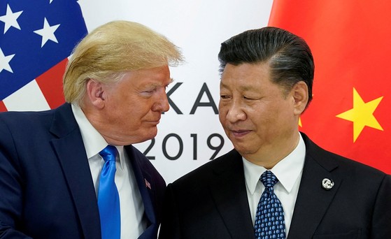 トランプ米大統領（左）と中国の習近平国家主席　［写真　ロイター＝聯合ニュース］