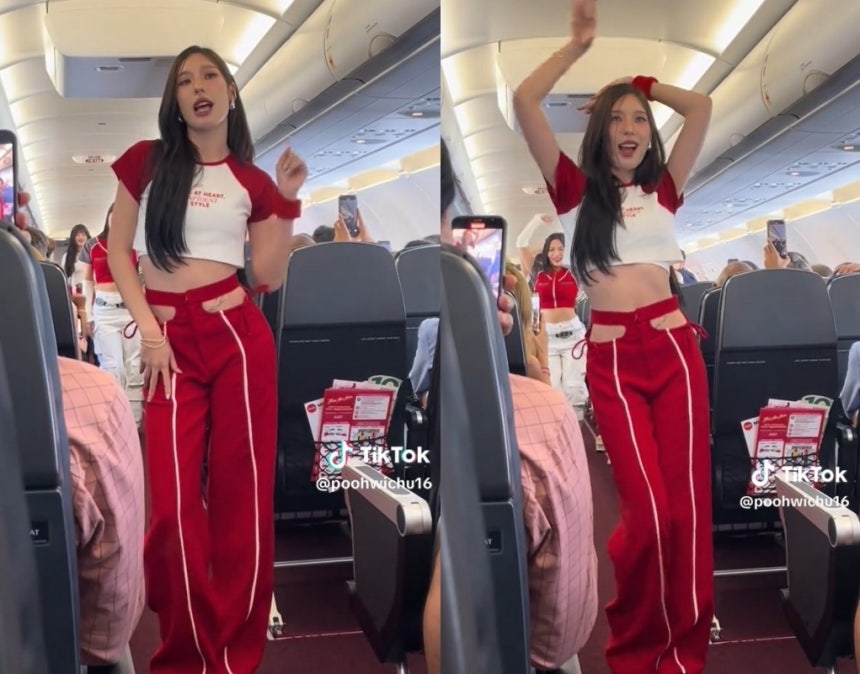   エアアジア航空機で踊る女性乗務員 ［写真 sns］