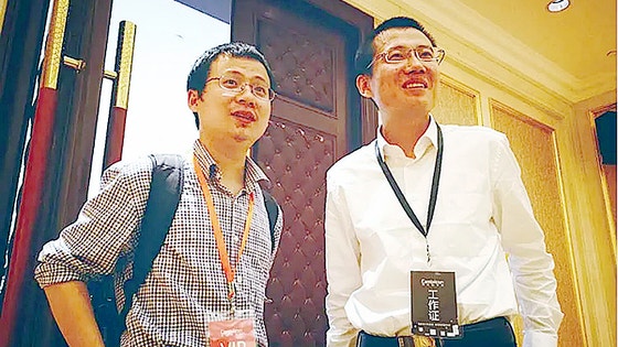 中国のAI半導体設計企業カンブリコンを創業した陳雲霽（左）と陳天石の兄弟。