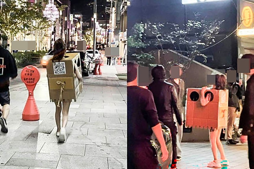 狎鴎亭ボックス女が繁華街を歩き回る様子。［写真 オンラインコミュニティ キャプチャー］