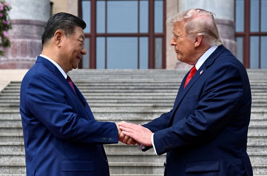 14日（現地時間）、中国北京の人民大会堂であいさつするトランプ米大統領と習近平主席 ［ロイター＝聯合ニュース］