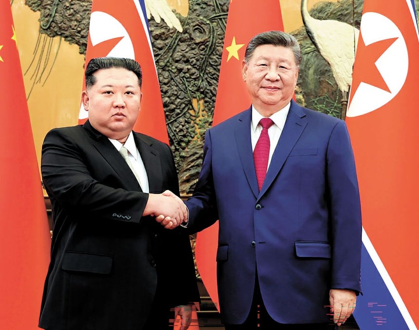 金正恩（キム・ジョンウン）朝鮮労働党総書記が昨年9月4日、北京の人民大会堂で習近平国家主席と会談し、握手している。［労働新聞＝ニュース1］
